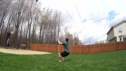 Frontflip basketball trick shot from 40 feet away