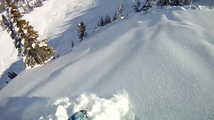 Snowboarder Gets Caught In Mini Avalanche
