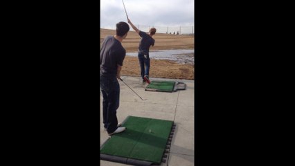 Two Friends Pull Off Incredible Golf Trick Shot