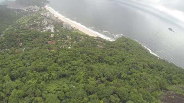 Wingsuit Base Jumper Lands Through Roof
