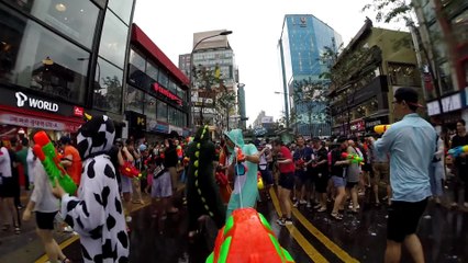 Massive water gun fight on the streets of Seoul, South Korea