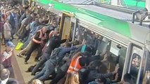 Australian commuters tilt train to free man's leg
