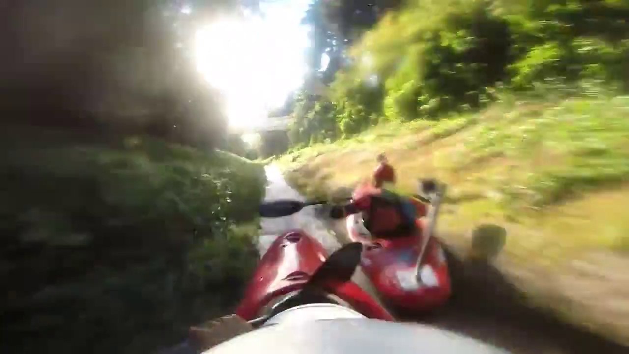 Kayakers Speed Down Drainage Ditch