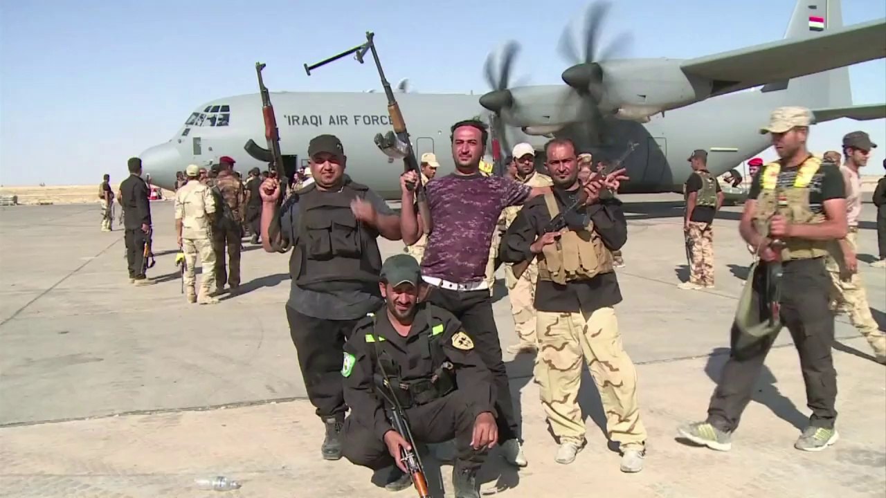 Iraqi forces keep control of airbase surrounded by insurgents