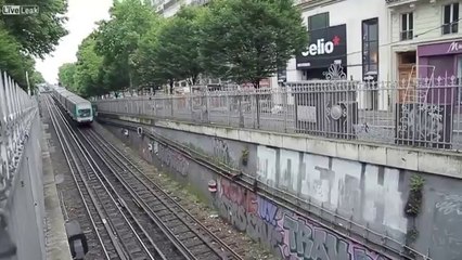 Crazy French Guy Jumps On The Roof Of A Train