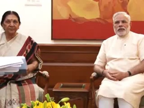 Anandiben Patel Gujarat CM ties Rakhi to PM Narendra Modi