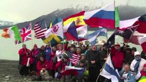 Amateur swimmers dive into cold waters of Perito Moreno glacier