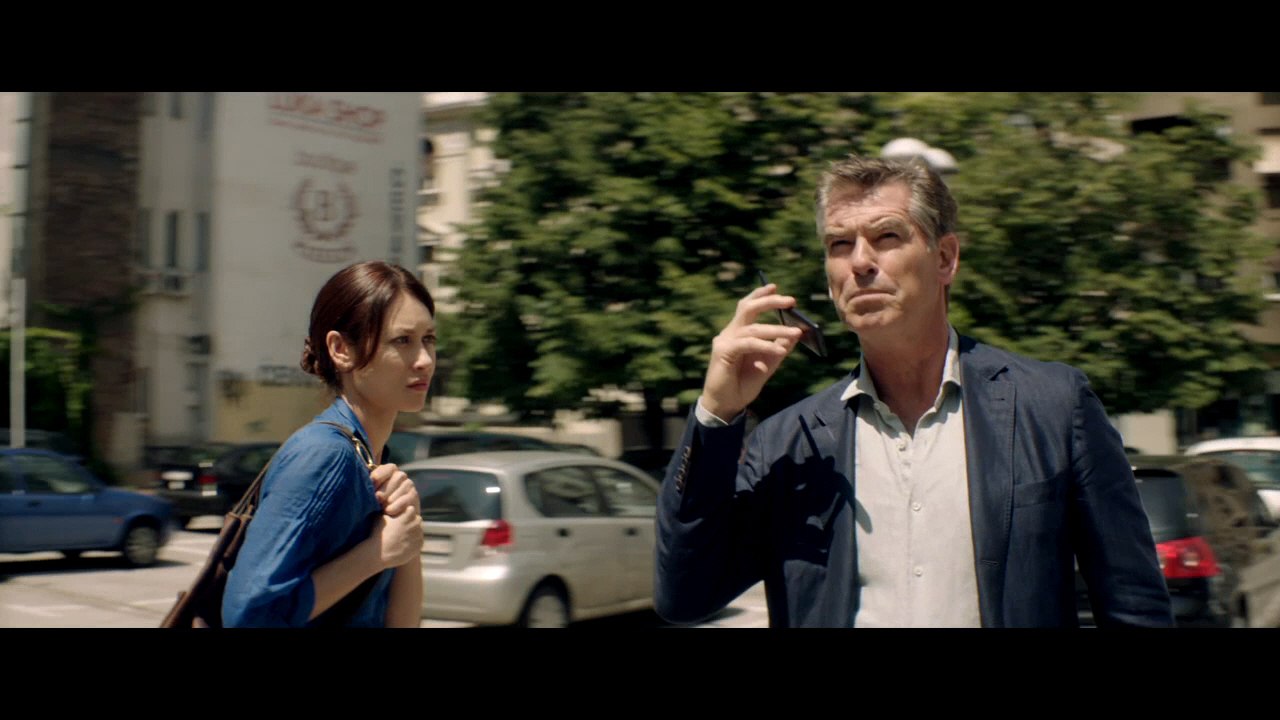 Olga Kurylenko, Pierce Brosnan In Action In 'The November Man'