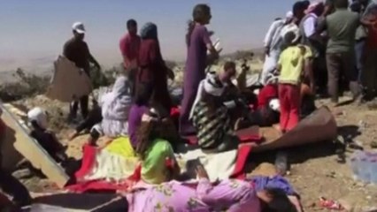 Footage shows pain of Yazidi refugees trapped on mountain