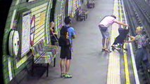Terrifying moment child in a buggy is blown on to tracks