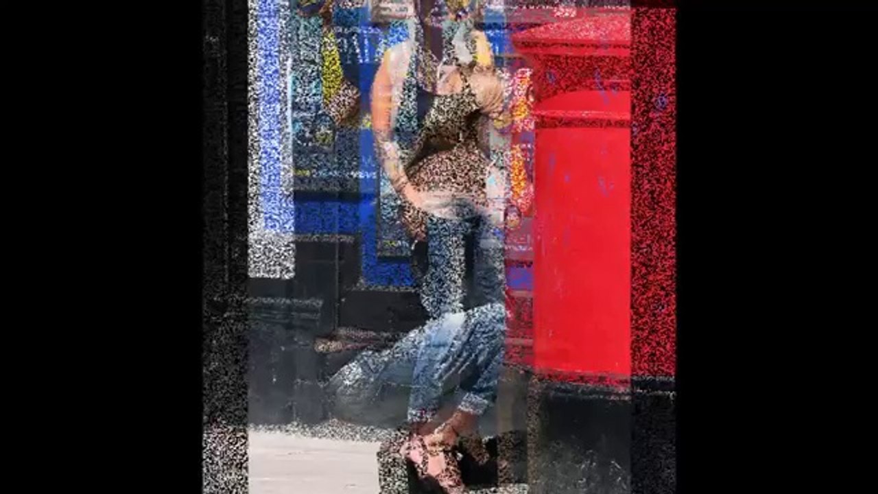 Supermodel Kate Moss flashes her builder's bum as she runs errands in baggy ripped jeans