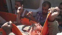 Survivor rescued from rubble after Syrian regime barrel bombs