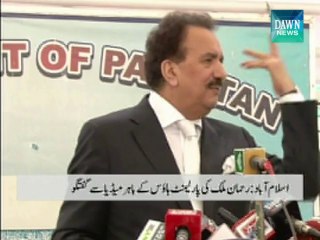 Rehman Malik talking to media