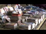 Pirated DVDs being sold on a streetside in India