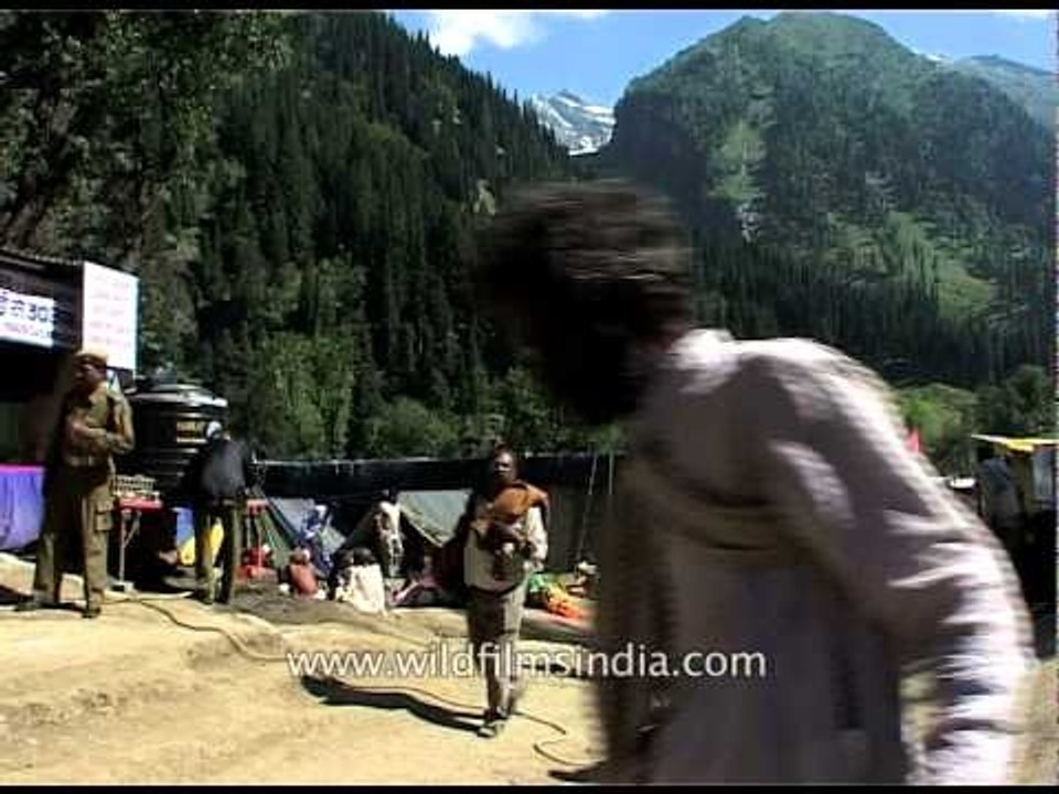Pilgrims and sadhus at Chandanwari base camp du...