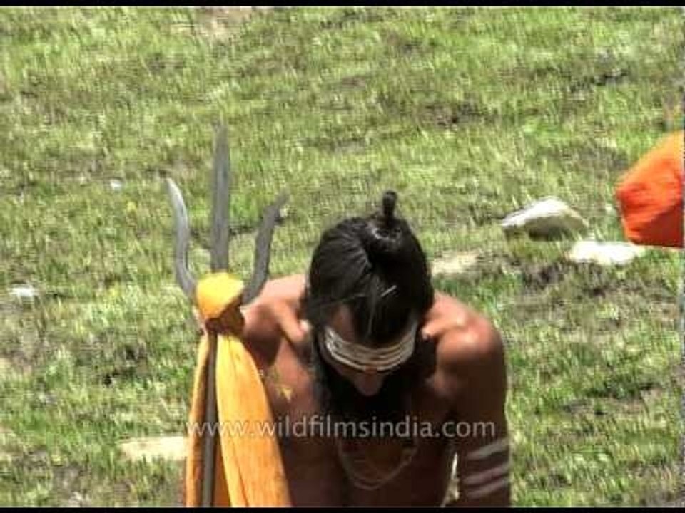 Pilgrims relax on trail to Amarnath cave shrine