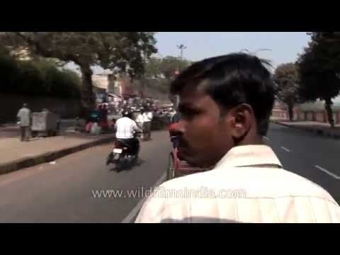 Rickshaw ride through busy roads of Delhi