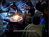 Man offers holy flames to pilgrims - Amarnath Yatra
