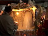 Pilgrims attend phallus aarti during Amarnath Yatra