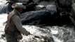 An angler fishing on Jhelum river during angling expedition in Kashmir