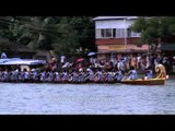 Visitors and participants in festive mood during snake boat race, Champakulam
