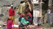 Woman sells religious goods along Amarnath trail