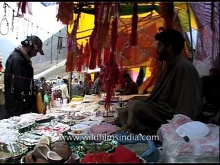 Religious items for sale in stalls on the way to Amarnath cave