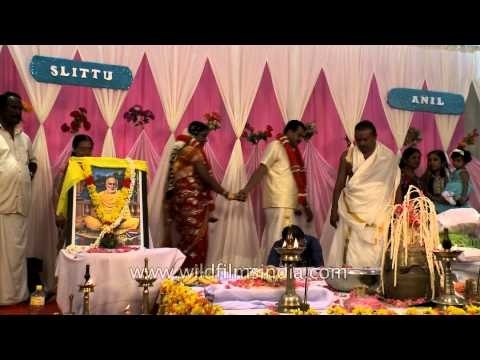 Couple perform wedding rituals: Kerala wedding