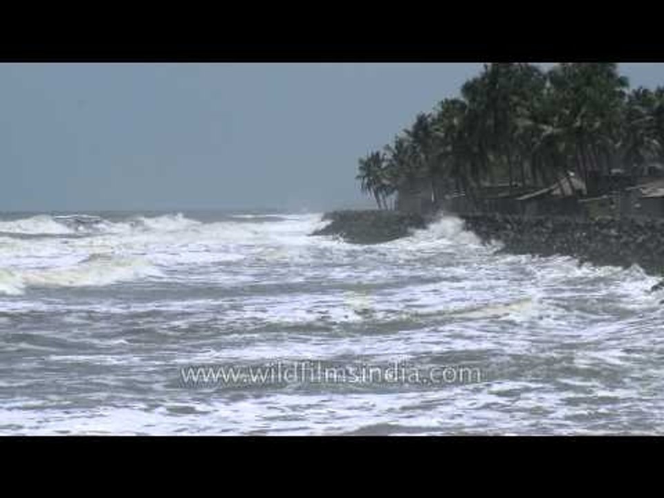 Waves hit shore of Neendakara beach, Kerala