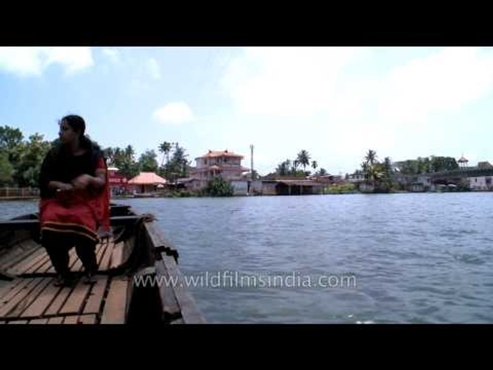Visitors taking a boat ride on Pamba river - Kerala