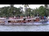 Tourists take a boat ride during Champakulam Boat race - Alleppey