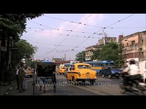 Hand-pulled rickshaws on streets of Kolkata