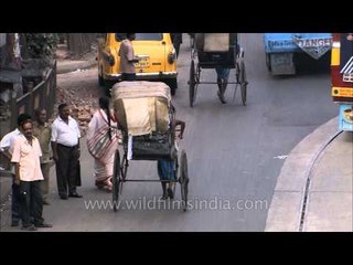 Human-pulled rickshaw in Kolkata