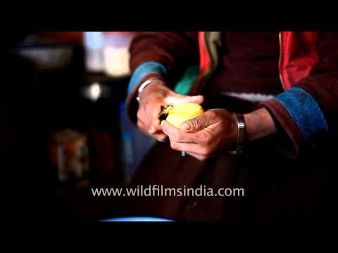 Ladakhi woman peeling potatoes