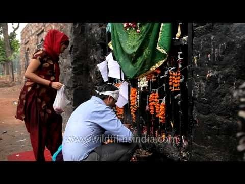 Praying to the Djinns at Feroz Shah Kotla - Delhi