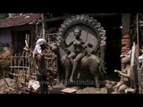 Clay idols under preparation at Kumortuli, Kolkata