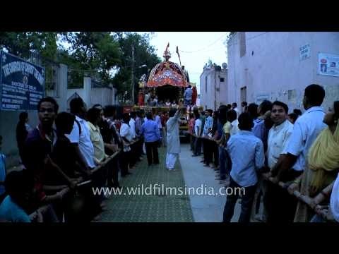 Devotees pull the chariot of Lord Jagannath