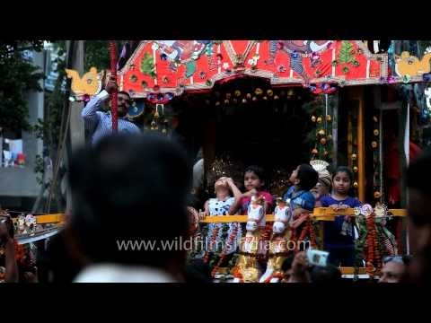 Devotees pull the chariot of Lord Jagannath