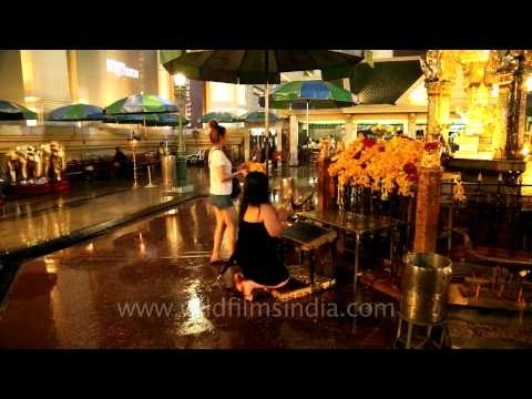 Devotees offer prayer at Erawan Shrine, Bangkok - Thailand