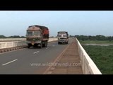 Trucks passing through Mahanadi Rock Bridge - Cuttack, Odisha