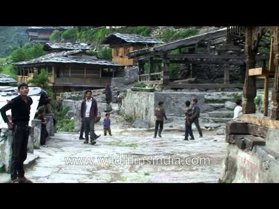 Village children play football at Himalayan village Osla, Uttarakhand