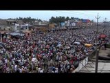Residents of Puri viewing Rath Yatra procession from their buildings
