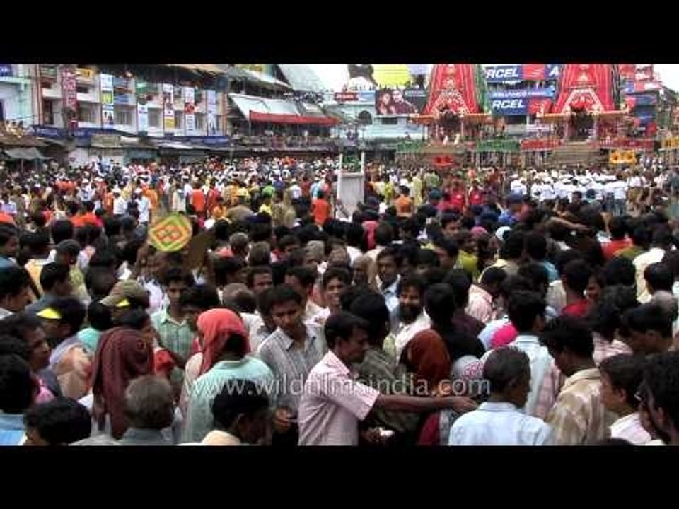 Devotees wait to pull three chariots during Rath Yatra - Odisha