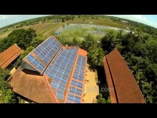 Solar panel installation on building roof-top in Asia
