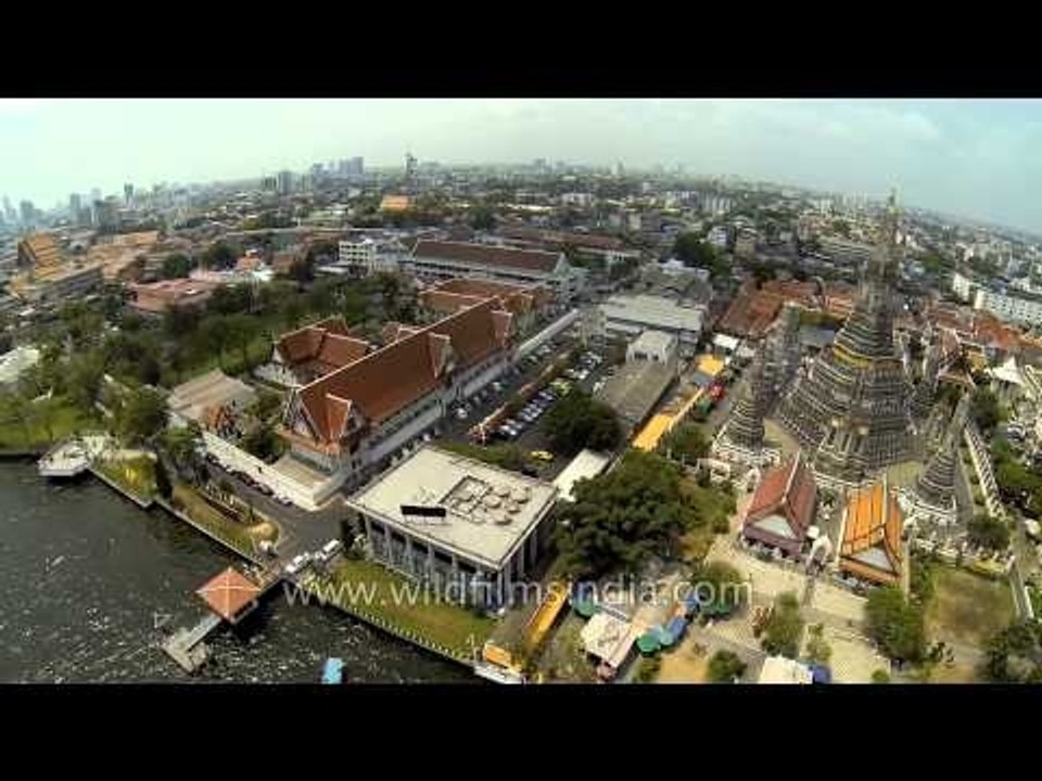 Aerial view of Wat Arun Temple along Chao Phraya River in Bangkok