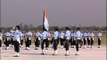 Indian Air Force (IAF) officers march with IAF flag