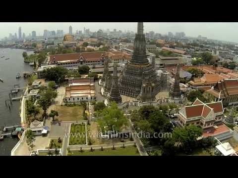 Boats ply the Chao Phraya river in the Venice of the east