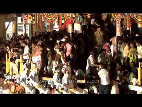 Devotees gather to witness the annual Rath Yatra in Puri