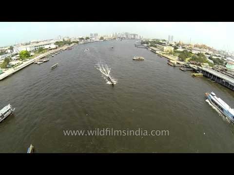 Express boats traveling along Chao Phraya River : Thailand