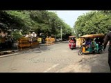 Electric rickshawalas waiting for their passengers at Sarojini Nagar